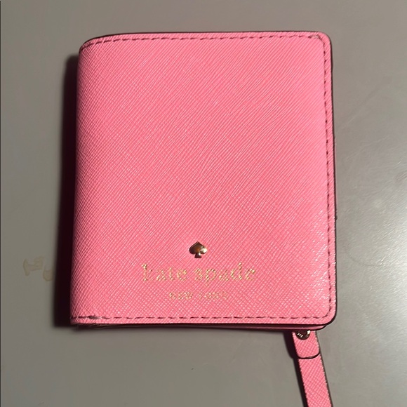 kate spade Handbags - Kate Spade Bubble Gum Pink Compact Wallet EUC